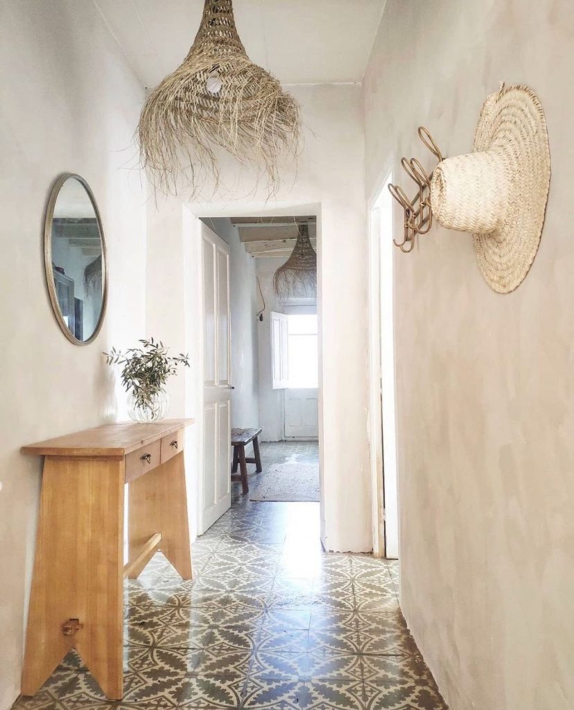 Kalklitir lime paint on a subtly textured wall in earthy tones, creating a warm, natural ambiance.