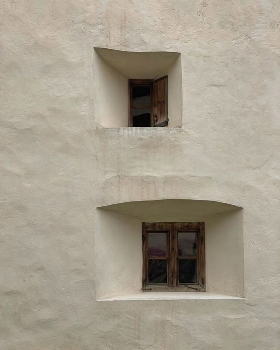 Natural lime mortar applied to a building exterior.