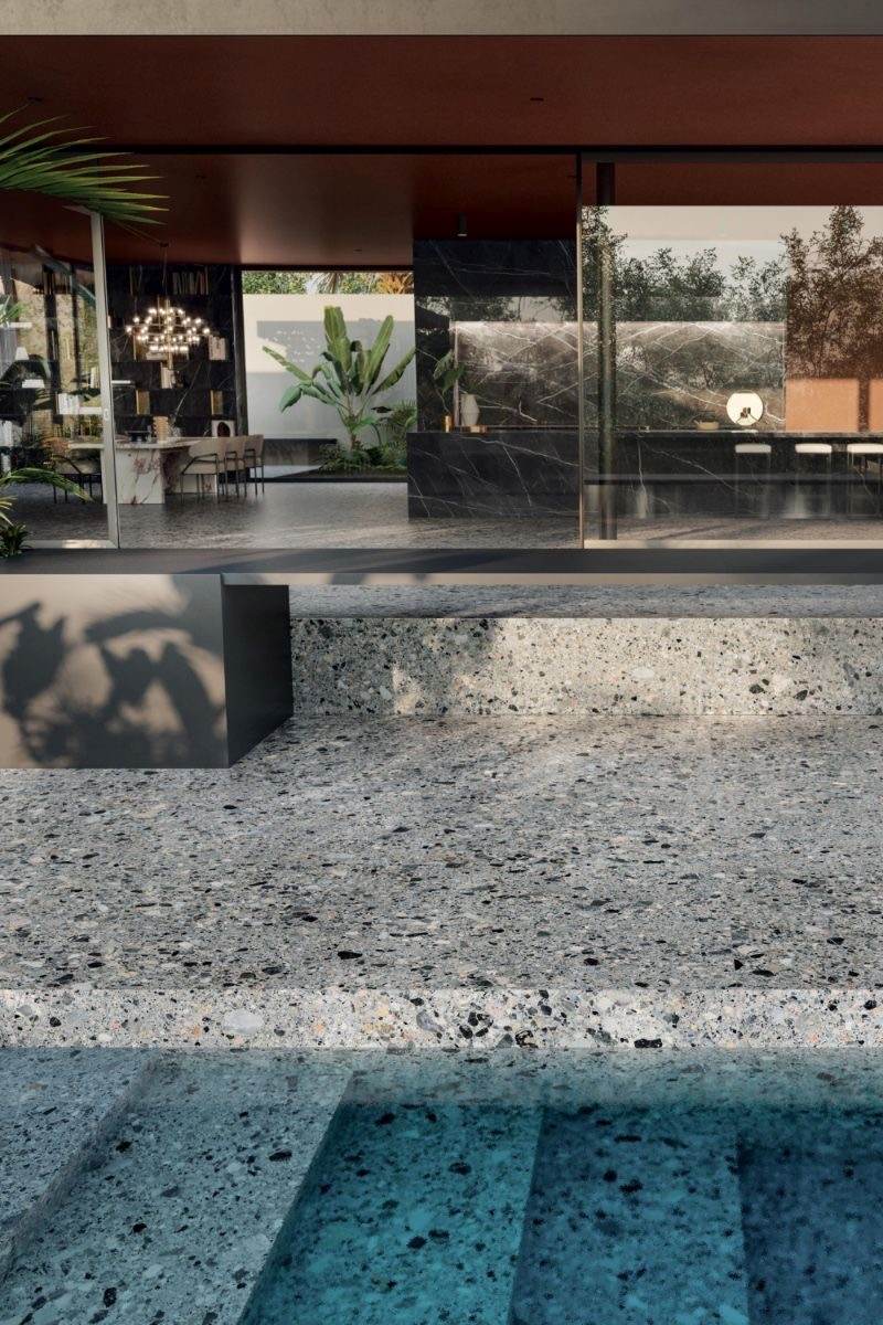 Marblepool finish on a pool surface, highlighting its luxurious micro-terrazzo texture.