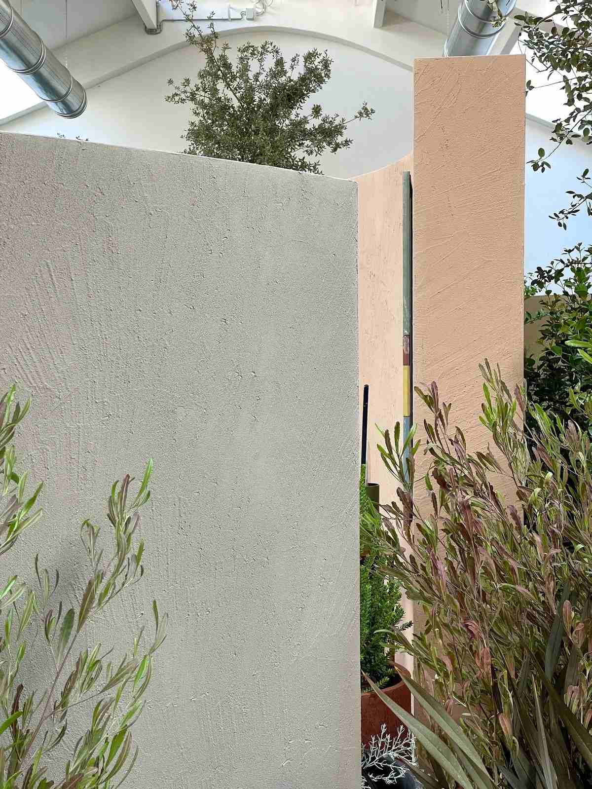 Close-up of a sample of Matteo Brioni clay plaster, highlighting its unique depth and mineral finish.