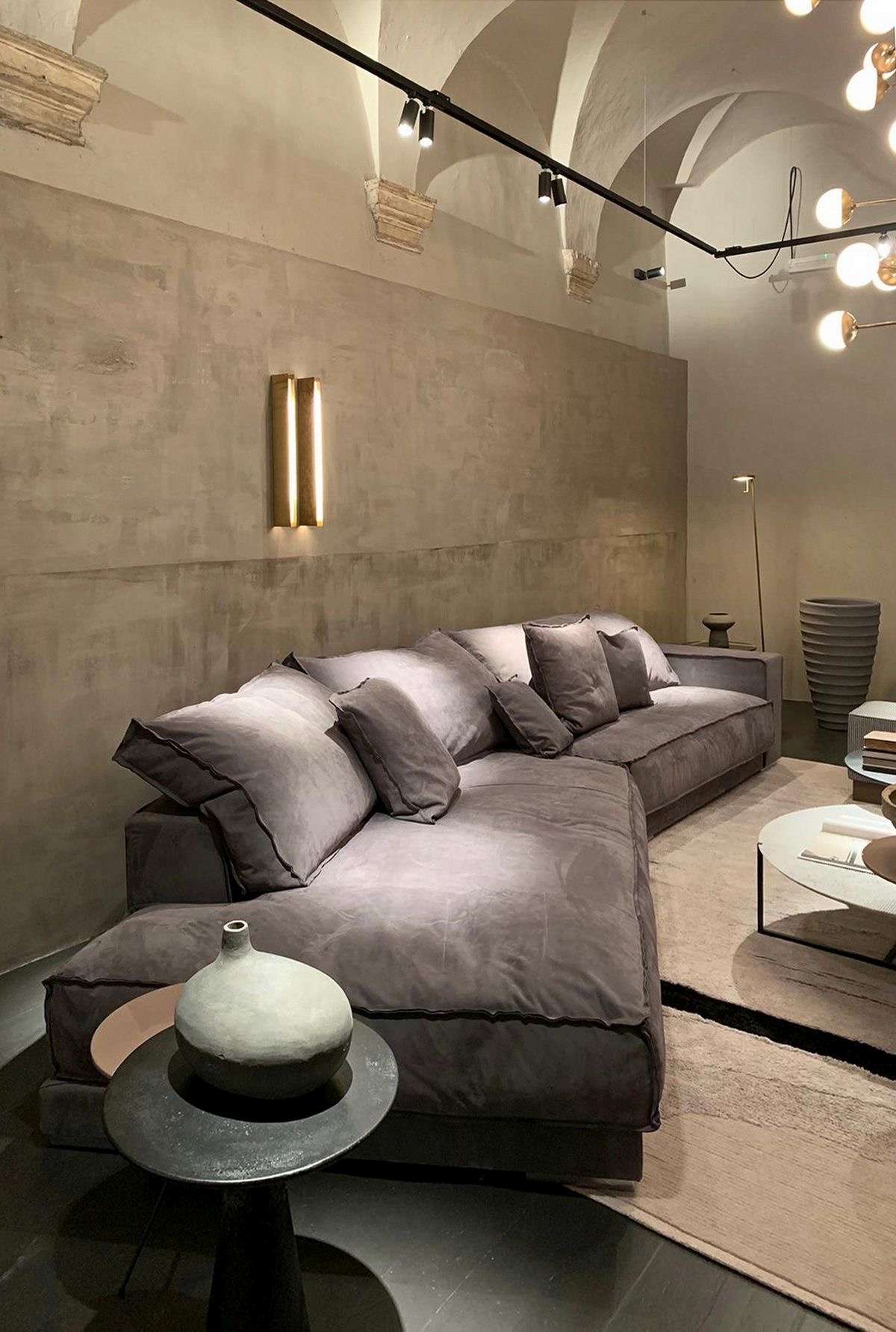 Close-up of a sample of Matteo Brioni clay plaster, highlighting its unique depth and mineral finish.