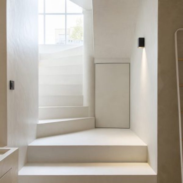 Mortex surface showcasing its distinctive seamless, mineral texture and subtle color variations.