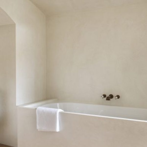 Mortex surface showcasing its distinctive seamless, mineral texture and subtle color variations.