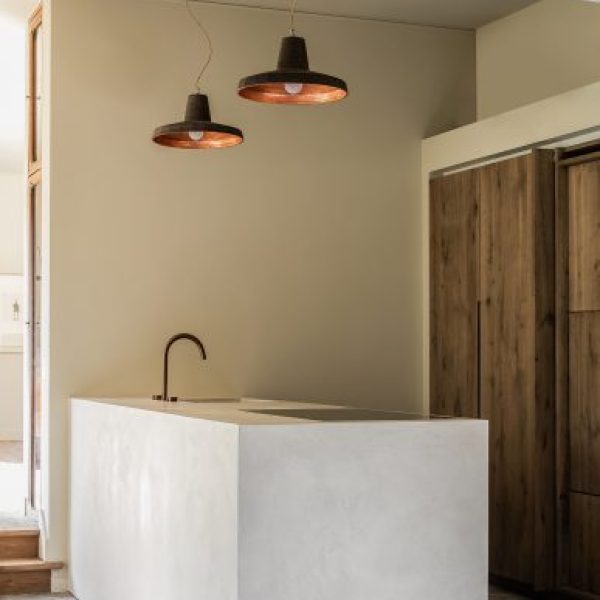 Mortex surface showcasing its distinctive seamless, mineral texture and subtle color variations.