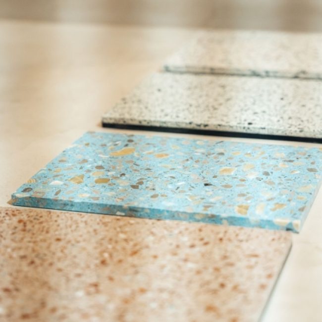 Seamless Bealstone floor with visible crystal aggregates, highlighting its modern terrazzo-style finish.