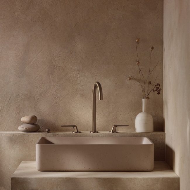 Seamless microcement floor in a luxurious contemporary space, showcasing its joint-free design.