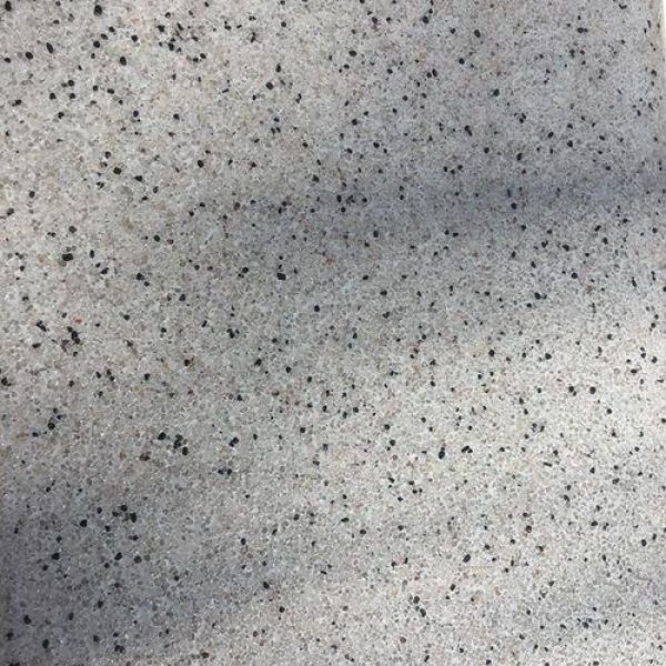 Marblepool finish on a pool surface, highlighting its luxurious micro-terrazzo texture.