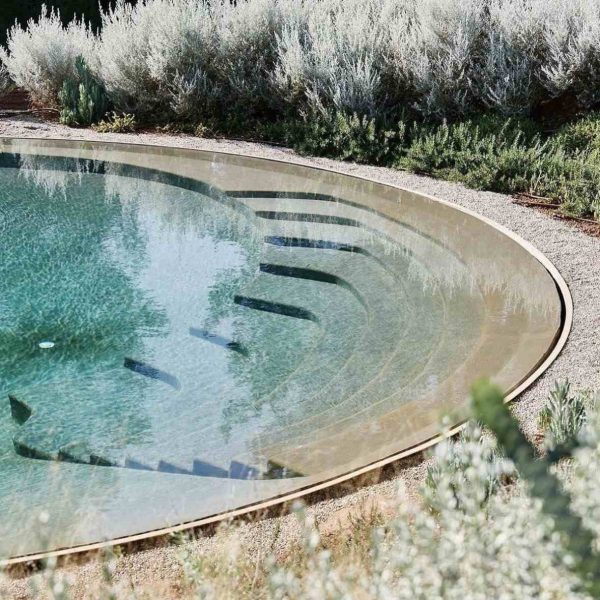 Marblepool finish on a swimming pool surface, showcasing its luxurious micro-terrazzo texture.