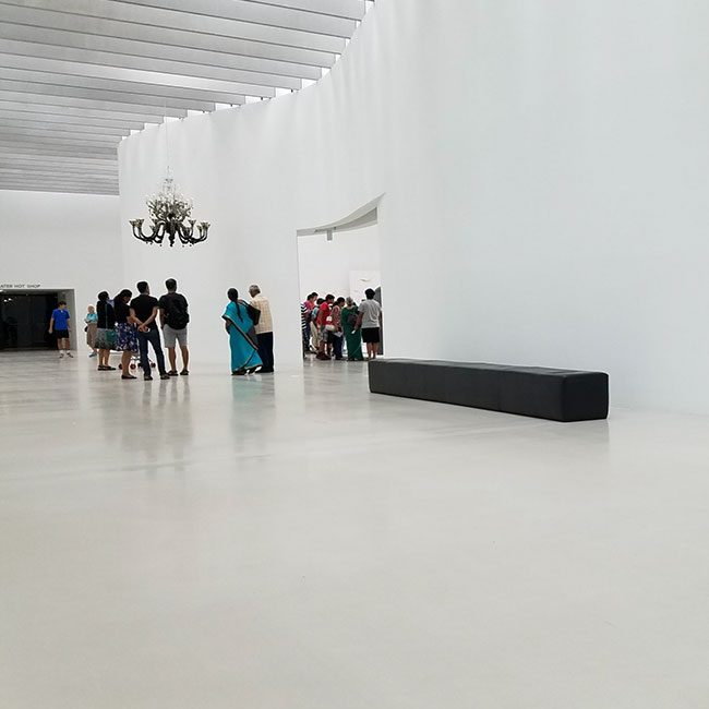 Seamless self-leveling floor creating a perfectly smooth, uniform base in a large interior space.